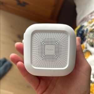Compact White Portable Speaker with Modern Design